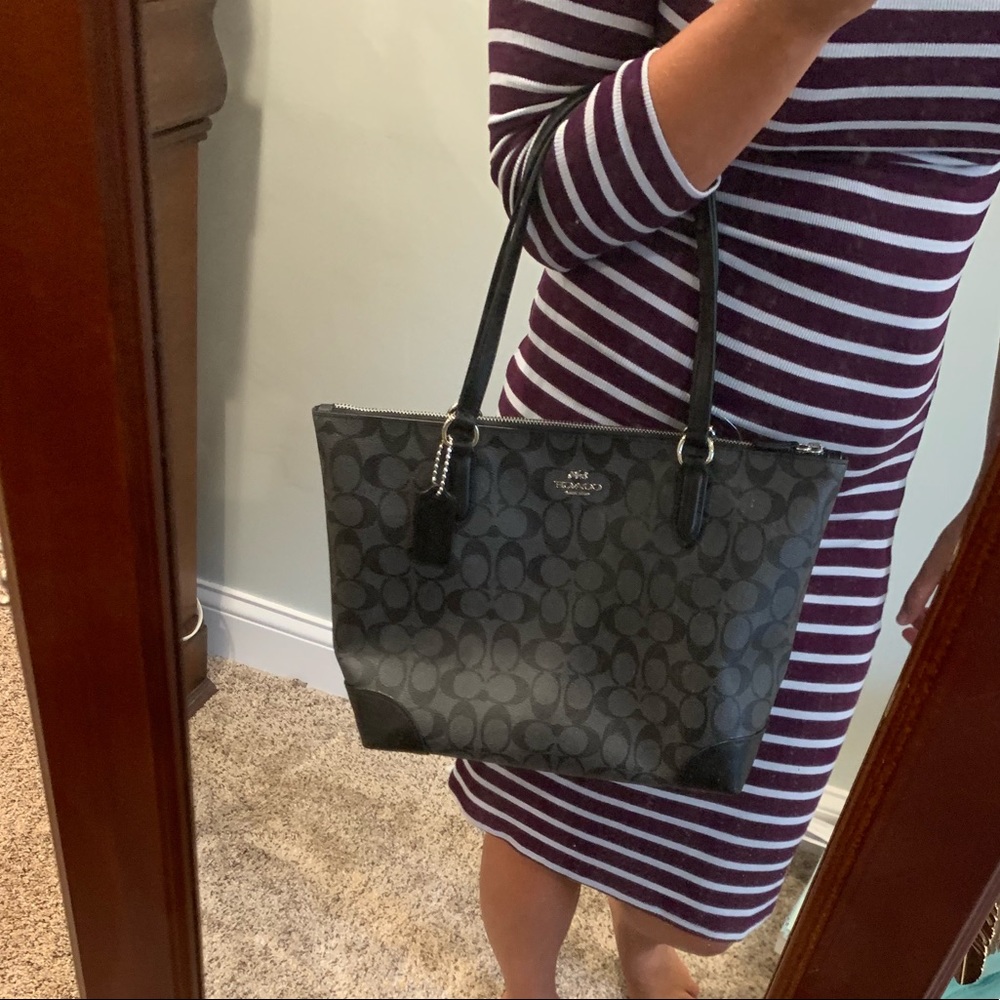 Coach black signature Saddie tote